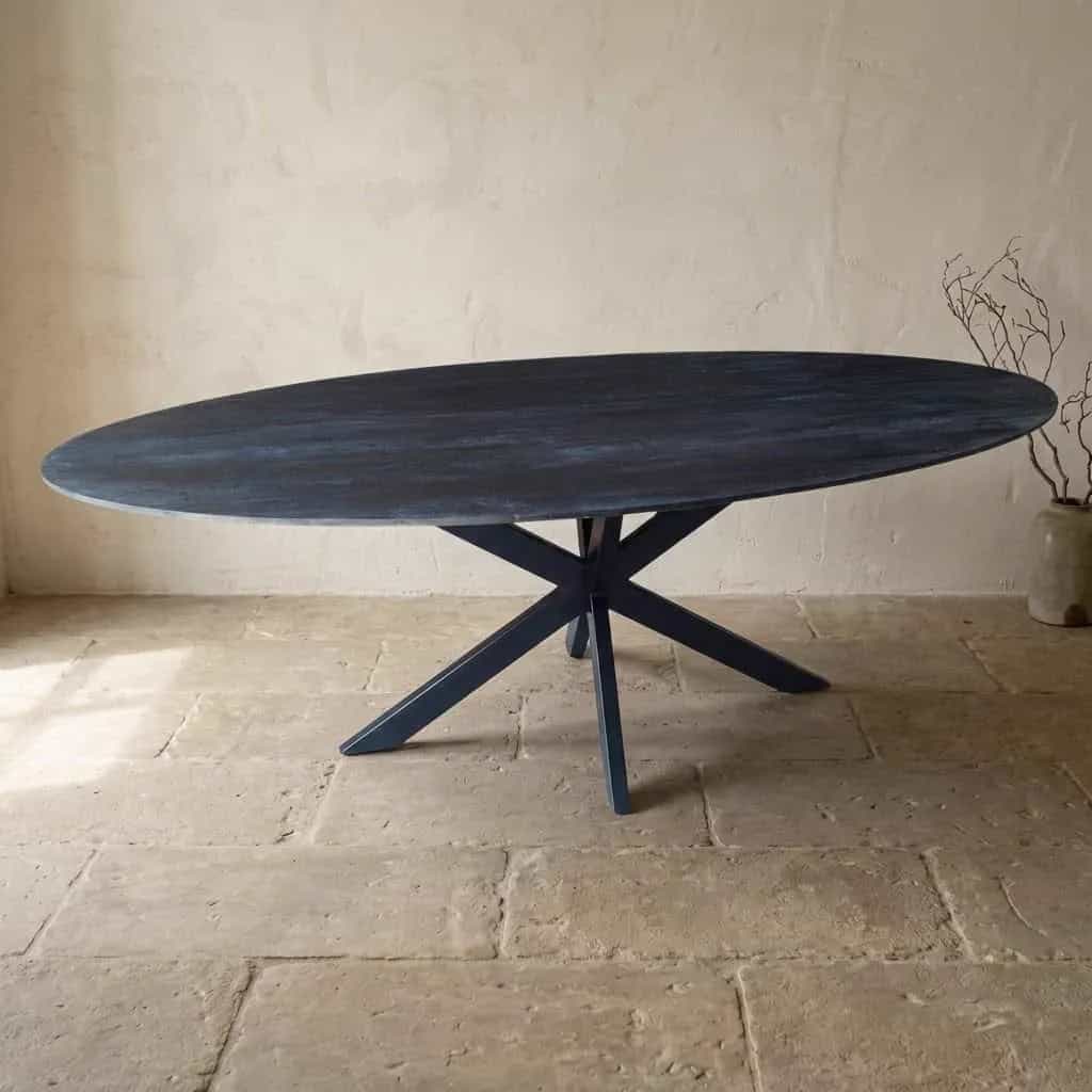 Esstisch Mangoholz oval schwarz Facettenkante